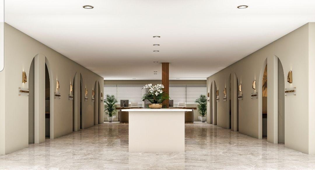 Office hallway with glass partitions and natural light