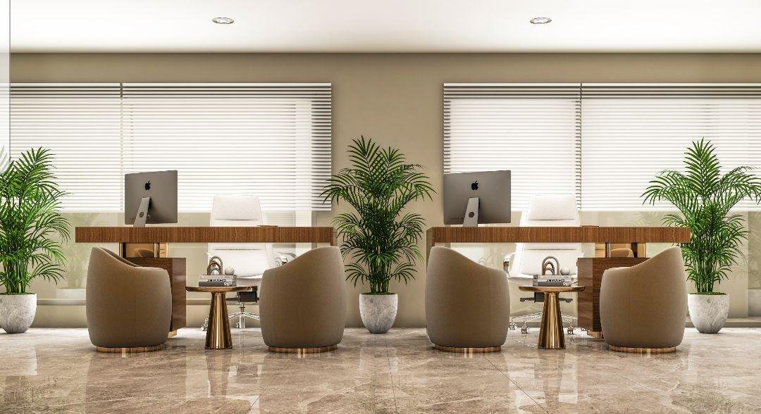 Office lounge with sofas and indoor plants